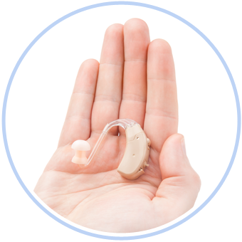 Person Holding a Hearing Aid